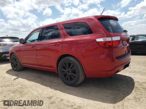 2012 Dodge Durango R/T with VIN 1C4SDHCT8CC130015, listed as a Copart auction lot 62122114 with 131,544 mi miles and Salvage title. Bid and sale history available at DreamBid. Image 2.