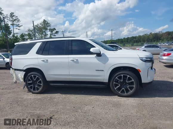 2024 Chevrolet Tahoe RST with VIN 1GNSCRKD2RR417057, listed as a IAAI auction lot 42925915 with 13,841 mi miles and . Bid and sale history available at DreamBid. Image 13.