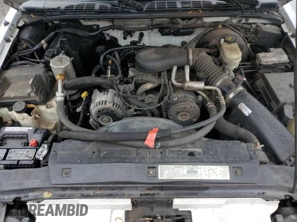 2001 Chevrolet Blazer LT with VIN 1GNCS13W312132549, listed as a Copart auction lot 90613665 with 207,148 mi miles and Salvage title. Bid and sale history available at DreamBid. Image 12.