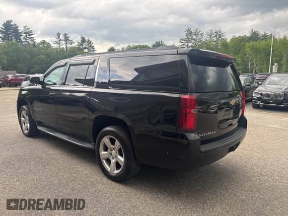 2015 Chevrolet Suburban LT z VIN 1GNSKJKC7FR205746, wystawiony jako IAAI lot #42403703 z przebiegiem 183 842 mil mil oraz . Historia ofert i sprzedaży dostępna na DreamBid. Obrazek 3.