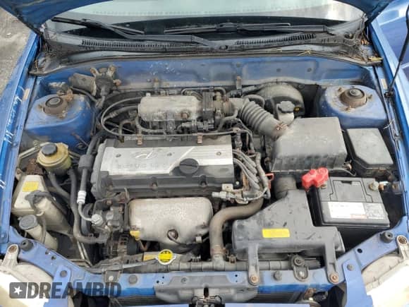 2002 Hyundai Accent GL z VIN KMHCG45C52U288494, wystawiony jako Copart lot #64835465 z przebiegiem 124 538 mil mil oraz Szkoda całkowita • Salvage title. Historia ofert i sprzedaży dostępna na DreamBid. Obrazek 11.