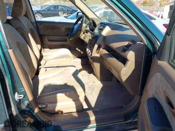 2002 Honda CR-V EX with VIN JHLRD78812C056208, listed as a IAAI auction lot 43477207 with 164,586 mi miles and . Bid and sale history available at DreamBid. Image 5.