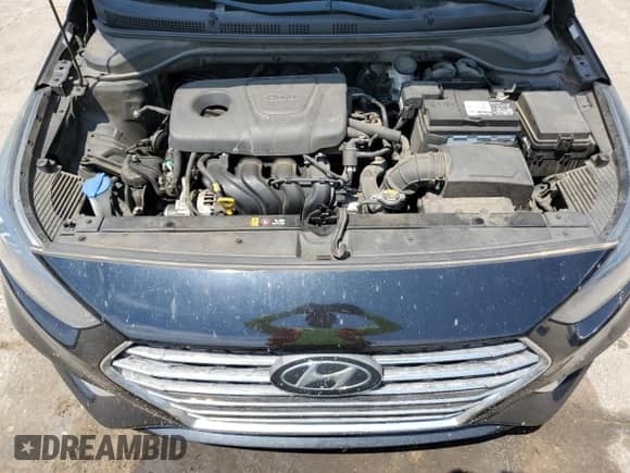 2019 Hyundai Accent Limited с VIN 3KPC34A35KE088073, выставлен на аукционе Copart как лот 70521255 с пробегом 113 666 миль миль и Списание • Salvage title. История ставок и продаж доступна на DreamBid. Изображение 11.