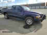 1998 Dodge Dakota SLT with VIN 1B7GG22Y8WS657716, listed as a Copart auction lot 51266605 with 234,149 mi miles and Salvage title. Bid and sale history available at DreamBid. Image 4.