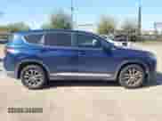 2020 Hyundai Santa Fe SE with VIN 5NMS23AD0LH141404, listed as a IAAI auction lot 41870350 with 144,109 mi miles and . Bid and sale history available at DreamBid. Image 14.