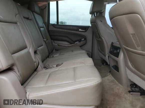 2016 Chevrolet Suburban LTZ z VIN 1GNSCJKCXGR215959, wystawiony jako Copart lot #41459895 z przebiegiem Nie podano mil oraz Szkoda całkowita • Salvage title. Historia ofert i sprzedaży dostępna na DreamBid. Obrazek 11.