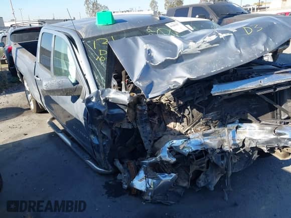 2016 Chevrolet Silverado 1500 LT z VIN 1GCRCRECXGZ212271, wystawiony jako IAAI lot #43200307 z przebiegiem Nie podano mil oraz . Historia ofert i sprzedaży dostępna na DreamBid. Obrazek 1.