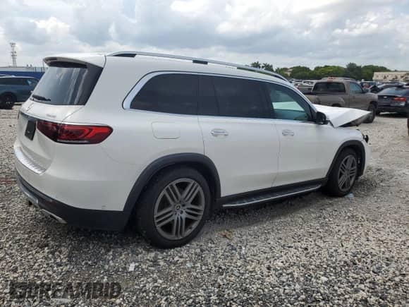 2022 Mercedes-Benz GLS 450 with VIN 4JGFF5KE1NA696833, listed as a Copart auction lot 70986725 with 57,589 mi miles and Salvage title. Bid and sale history available at DreamBid. Image 3.