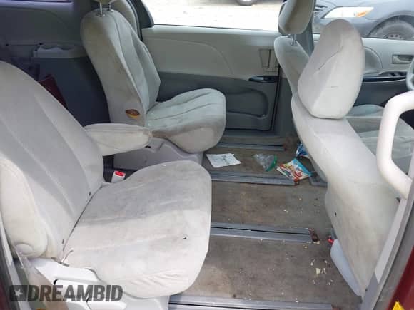 2013 Toyota Sienna L with VIN 5TDZK3DC7DS298153, listed as a IAAI auction lot 42435839 with 161,725 mi miles and . Bid and sale history available at DreamBid. Image 8.