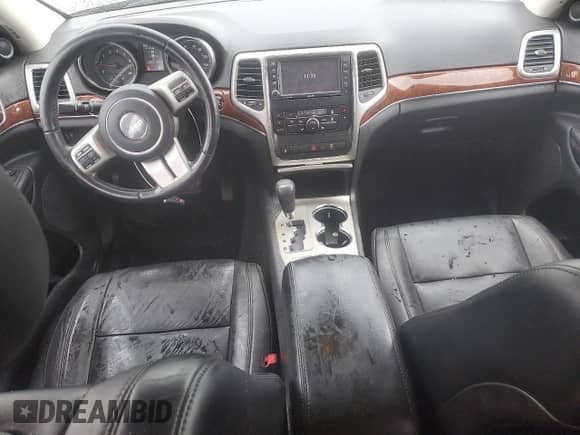 2012 Jeep Grand Cherokee Limited z VIN 1C4RJFBG2CC187150, wystawiony jako Copart lot #84956805 z przebiegiem 136 040 mil mil oraz Szkoda całkowita • Salvage title. Historia ofert i sprzedaży dostępna na DreamBid. Obrazek 8.