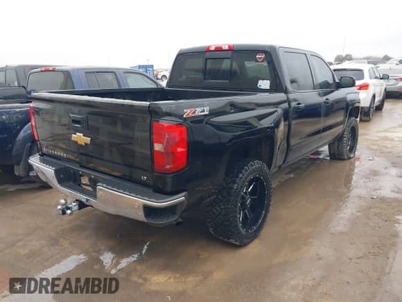 2015 Chevrolet Silverado 1500 LT with VIN 3GCUKREH8FG239959, listed as a IAAI auction lot 41483334 with 180,739 mi miles and . Bid and sale history available at DreamBid. Image 4.