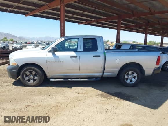2012 Ram 1500 ST with VIN 1C6RD6FK2CS207531, listed as a IAAI auction lot 42623849 with 104,742 mi miles and . Bid and sale history available at DreamBid. Image 14.