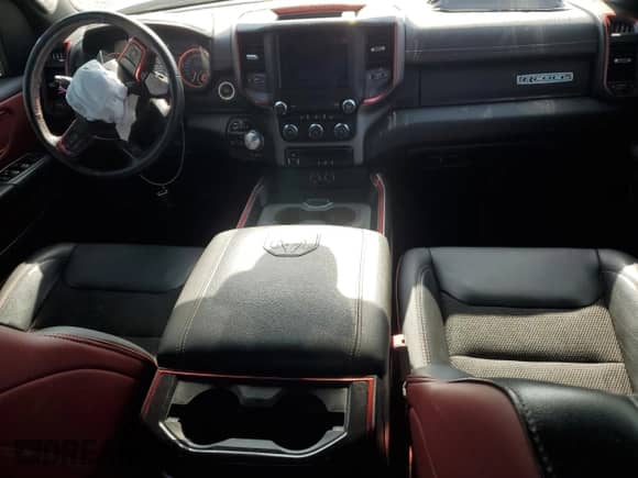 2020 Ram 1500 Rebel z VIN 1C6SRFLT7LN199084, wystawiony jako Copart lot #64990655 z przebiegiem 143 021 mil mil oraz Nie do naprawy • Non repairable. Historia ofert i sprzedaży dostępna na DreamBid. Obrazek 8.