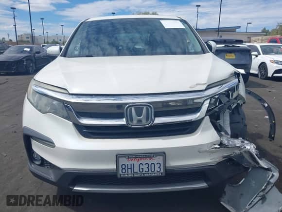 2019 Honda Pilot EX-L with VIN 5FNYF6H54KB047279, listed as a IAAI auction lot 43281886 with 122,627 mi miles and . Bid and sale history available at DreamBid. Image 12.