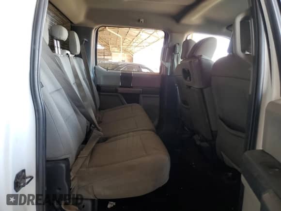 2020 Ford F-150 XL with VIN 1FTEW1C45LKD11814, listed as a Copart auction lot 69002595 with 106,500 mi miles and Salvage title. Bid and sale history available at DreamBid. Image 10.