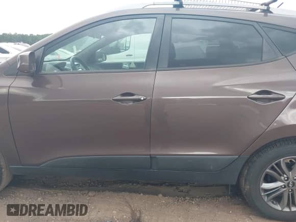 2014 Hyundai Tucson SE with VIN KM8JU3AG8EU790553, listed as a IAAI auction lot 42975966 with 191,464 mi miles and . Bid and sale history available at DreamBid. Image 14.
