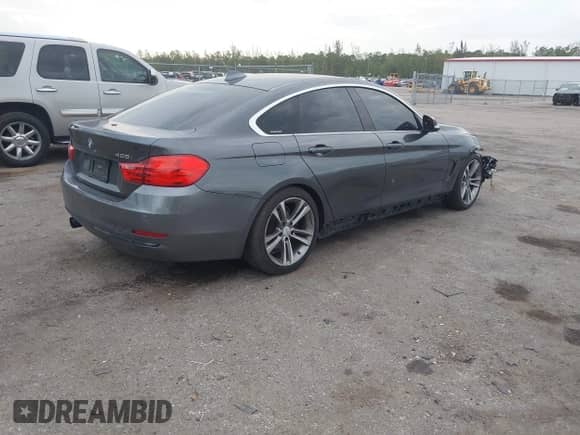 2016 BMW 4 Series 428i with VIN WBA4A9C57GG507387, listed as a IAAI auction lot 41980045 with 165,424 mi miles and . Bid and sale history available at DreamBid. Image 4.