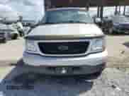 2002 Ford F-150 XL z VIN 1FTRX17W82NB59499, wystawiony jako Copart lot #85295365 z przebiegiem 191 328 mil mil oraz Szkoda całkowita • Salvage title. Historia ofert i sprzedaży dostępna na DreamBid. Obrazek 5.