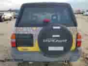 2003 Chevrolet Tracker with VIN 2CNBE18C136928311, listed as a Copart auction lot 84463154 with 118,195 mi miles and Salvage title. Bid and sale history available at DreamBid. Image 6.
