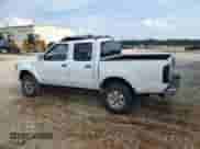 2001 Nissan Frontier SE with VIN 1N6ED27T91C344946, listed as a Copart auction lot 57488105 with 183,127 mi miles and Salvage title. Bid and sale history available at DreamBid. Image 2.