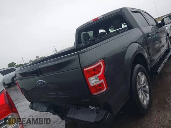 2018 Ford F-150 XL with VIN 1FTEW1CP6JKE44024, listed as a IAAI auction lot 42484385 with 104,914 mi miles and . Bid and sale history available at DreamBid. Image 16.