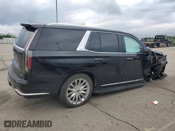 2023 Cadillac Escalade 4WD Premium Luxury with VIN 1GYS4BKL5PR395938, listed as a Copart auction lot 57291515 with 38,863 mi miles and Salvage title. Bid and sale history available at DreamBid. Image 3.