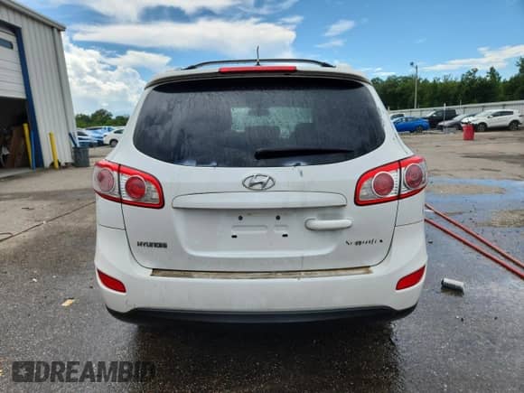 2011 Hyundai Santa Fe SE с VIN 5XYZH4AG2BG043030, выставлен на аукционе Copart как лот 64979255 с пробегом 157 696 миль миль и Списание • Salvage title. История ставок и продаж доступна на DreamBid. Изображение 6.