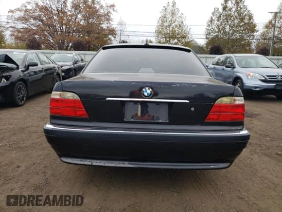 2001 BMW 7 Series 740iL z VIN WBAGH83431DP33588, wystawiony jako Copart lot #90679965 z przebiegiem Nie podano mil oraz Czysty tytuł • Clean title. Historia ofert i sprzedaży dostępna na DreamBid. Obrazek 6.