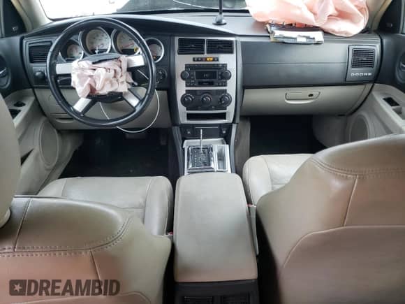2006 Dodge Magnum with VIN 2D4FV47V76H124195, listed as a Copart auction lot 48734725 with 196,437 mi miles and Salvage title. Bid and sale history available at DreamBid. Image 8.