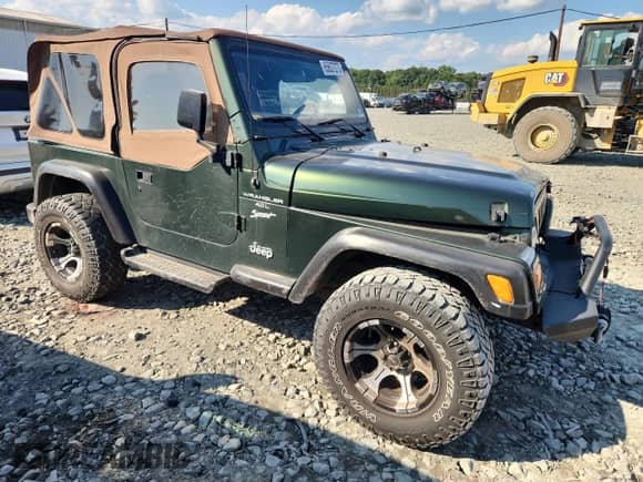 1997 Jeep Wrangler Sport with VIN 1J4FY19S0VP430844, listed as a Copart auction lot 65827275 with 91,868 mi miles and Salvage title. Bid and sale history available at DreamBid. Image 4.