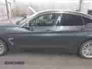 2015 BMW 4 Series 428i xDrive with VIN WBA4A7C52FD414734, listed as a IAAI auction lot 42377682 with 129,264 mi miles and . Bid and sale history available at DreamBid. Image 14.