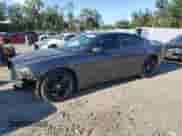 2014 Dodge Charger SXT with VIN 2C3CDXHGXEH348567, listed as a Copart auction lot 84801005 with 59,295 mi miles and Salvage title. Bid and sale history available at DreamBid. Image 1.