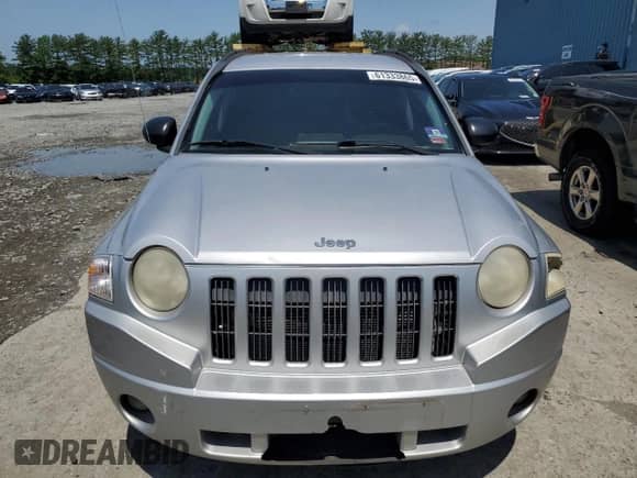 2007 Jeep Compass Sport with VIN 1J8FT47W87D158424, listed as a Copart auction lot 61333865 with 243,861 mi miles and Salvage title. Bid and sale history available at DreamBid. Image 5.