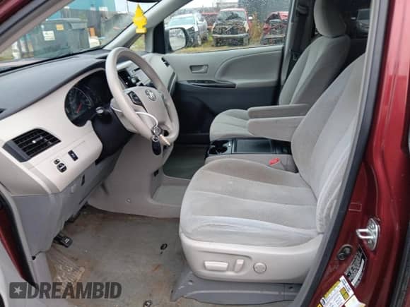 2014 Toyota Sienna LE with VIN 5TDJK3DC8ES083704, listed as a Copart auction lot 84932195 with 210,428 mi miles and Salvage title. Bid and sale history available at DreamBid. Image 7.