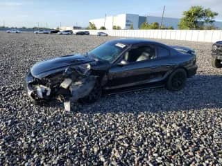 1994 Ford Mustang with VIN 1FALP42D6RF204303, listed as a Copart auction lot 90278045 with 171,175 mi miles and Salvage title. Bid and sale history available at DreamBid. Image 1.