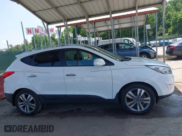 2015 Hyundai Tucson Limited z VIN KM8JUCAG3FU092093, wystawiony jako IAAI lot #42451431 z przebiegiem 91 649 mil mil oraz . Historia ofert i sprzedaży dostępna na DreamBid. Obrazek 13.