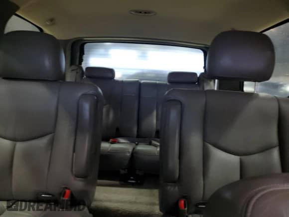 2003 Chevrolet Tahoe LS z VIN 1GNEC13Z33R281053, wystawiony jako Copart lot #69859815 z przebiegiem 167 551 mil mil oraz Szkoda całkowita • Salvage title. Historia ofert i sprzedaży dostępna na DreamBid. Obrazek 10.