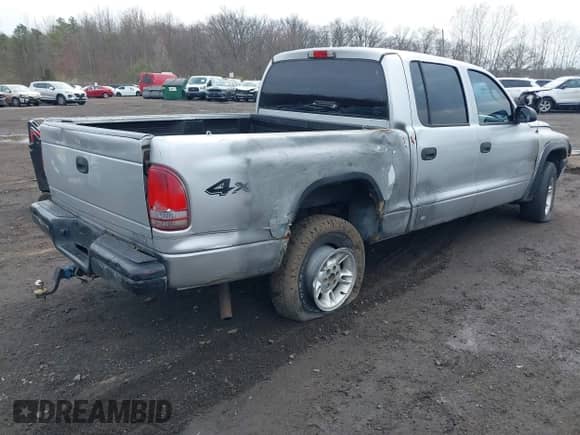 2003 Dodge Dakota Sport with VIN 1D7HG38X13S267227, listed as a IAAI auction lot 41952281 with 119,641 mi miles and . Bid and sale history available at DreamBid. Image 4.
