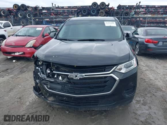 2021 Chevrolet Traverse LS z VIN 1GNERFKW0MJ244559, wystawiony jako IAAI lot #42461606 z przebiegiem 51 923 mil mil oraz . Historia ofert i sprzedaży dostępna na DreamBid. Obrazek 12.