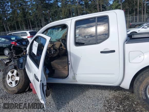 2007 Nissan Frontier Nismo z VIN 1N6AD07W17C434002, wystawiony jako IAAI lot #42173461 z przebiegiem Nie podano mil oraz . Historia ofert i sprzedaży dostępna na DreamBid. Obrazek 14.