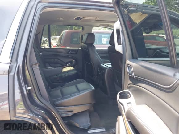 2015 Chevrolet Tahoe LTZ with VIN 1GNSKCKC2FR588524, listed as a IAAI auction lot 42851274 with 101,426 mi miles and . Bid and sale history available at DreamBid. Image 8.