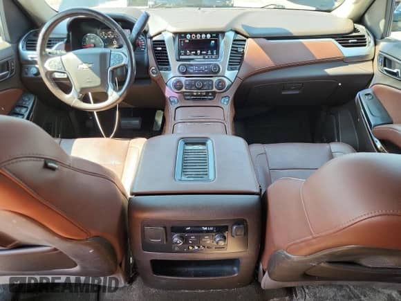 2016 Chevrolet Tahoe LTZ with VIN 1GNSKCKC8GR311975, listed as a Copart auction lot 69664515 with 129,583 mi miles and Salvage title. Bid and sale history available at DreamBid. Image 8.