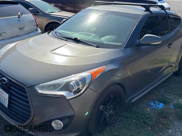 2013 Hyundai Veloster Turbo с VIN KMHTC6AE3DU097576, выставлен на аукционе Copart как лот 82102005 с пробегом 140 467 миль миль и Чистый • Clean title. История ставок и продаж доступна на DreamBid. Изображение 2.