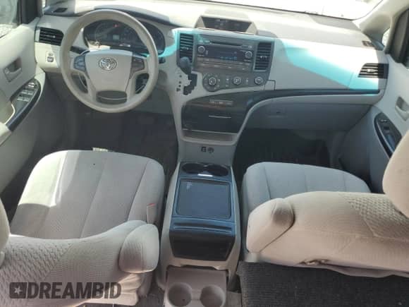 2012 Toyota Sienna LE with VIN 5TDJK3DC2CS044393, listed as a Copart auction lot 63579595 with 152,636 mi miles and Salvage title. Bid and sale history available at DreamBid. Image 8.