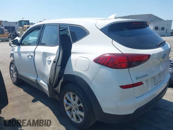 2019 Hyundai Tucson SE z VIN KM8J2CA42KU980257, wystawiony jako IAAI lot #43150990 z przebiegiem 117 808 mil mil oraz . Historia ofert i sprzedaży dostępna na DreamBid. Obrazek 3.