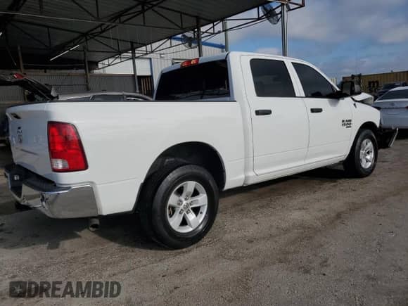 2023 Ram 1500 SLT z VIN 1C6RR6LG7PS533834, wystawiony jako Copart lot #57865545 z przebiegiem 45 449 mil mil oraz Nie do naprawy • Non repairable. Historia ofert i sprzedaży dostępna na DreamBid. Obrazek 3.