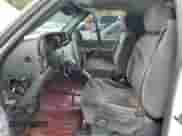 2002 GMC Sierra 1500 SLE with VIN 1GTEC14V22Z344470, listed as a Copart auction lot 74596054 with 165,810 mi miles and Salvage title. Bid and sale history available at DreamBid. Image 7.