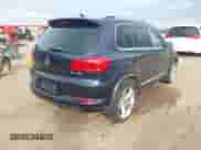 2015 Volkswagen Tiguan S with VIN WVGAV7AX7FW093868, listed as a IAAI auction lot 43143969 with 116,252 mi miles and . Bid and sale history available at DreamBid. Image 4.