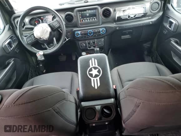 2023 Jeep Wrangler with VIN 1C4JJXN6XPW592022, listed as a Copart auction lot 84292005 with 33,727 mi miles and Salvage title. Bid and sale history available at DreamBid. Image 8.