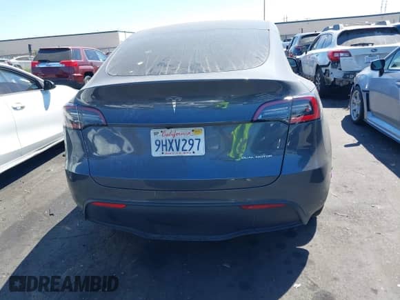 2023 Tesla Model Y Long Range with VIN 7SAYGDEE5PF865572, listed as a IAAI auction lot 43067262 with 56,508 mi miles and . Bid and sale history available at DreamBid. Image 17.